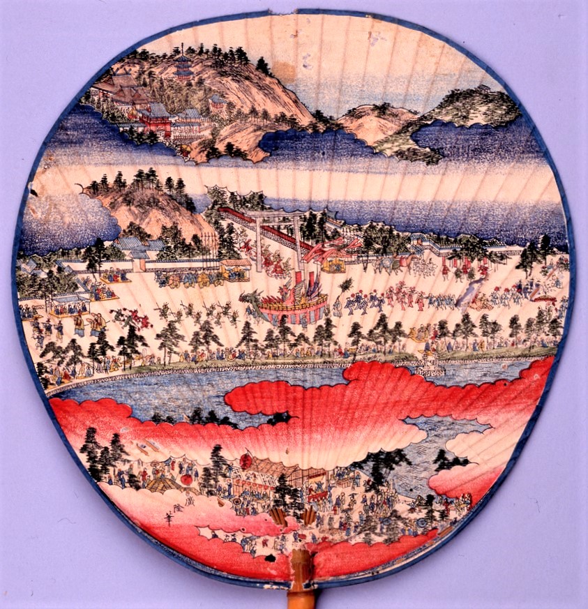 A fan with a scene of the Waka-matsuri Festival, original painting by Hirotaka Iwahashi (museum collection).